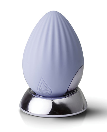 Niya 4 Palm Held Massager Cornflower Rebranded Packaging